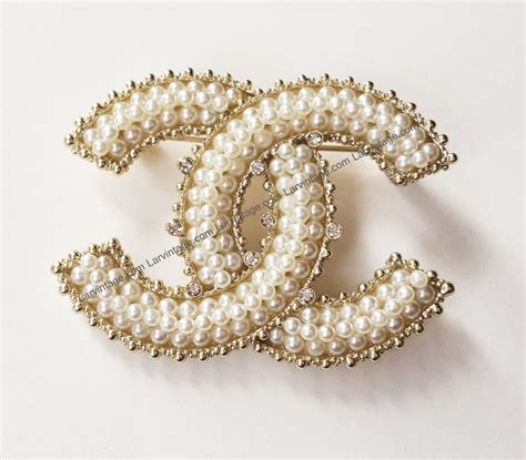 chanel brooch real vs fake|authentic chanel charm bracelets.